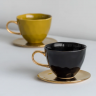 Tasse "Noire" à anse dorée